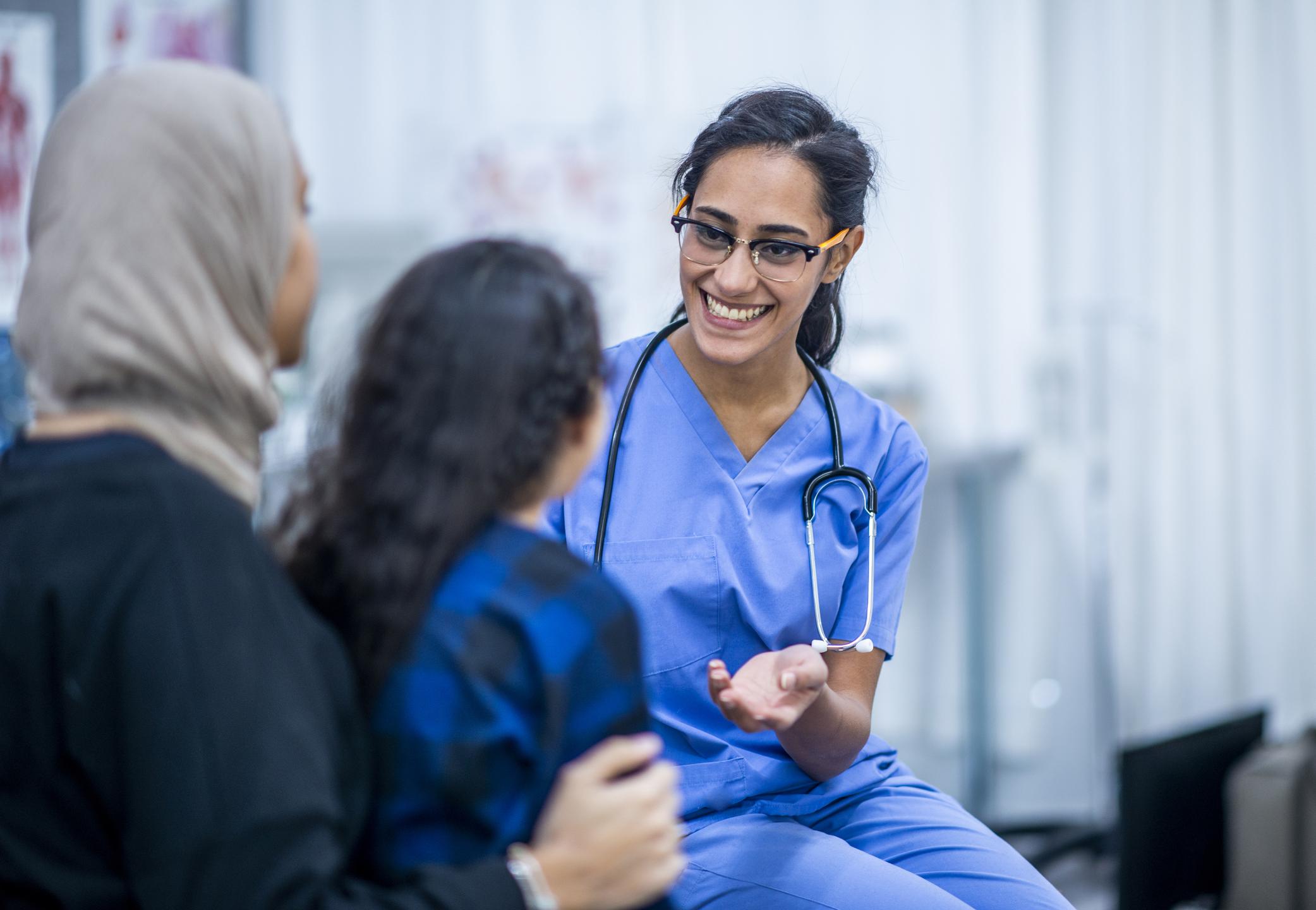 Nurse talking to patients